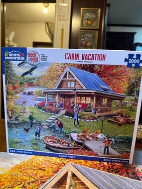 White Mountain Cabin Vacation Puzzle with Blue Roof and Autumn Colors